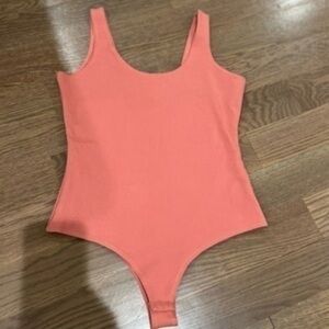 Sella luce bodysuit size M